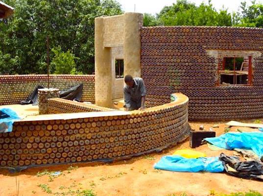 NGO based in Nigeria, made a Africa's first plastic bottle house,it is bullet and fireproof, earthquake resistant, and maintains a comfortable interior temperature of 64 degrees Fahrenheit year round!